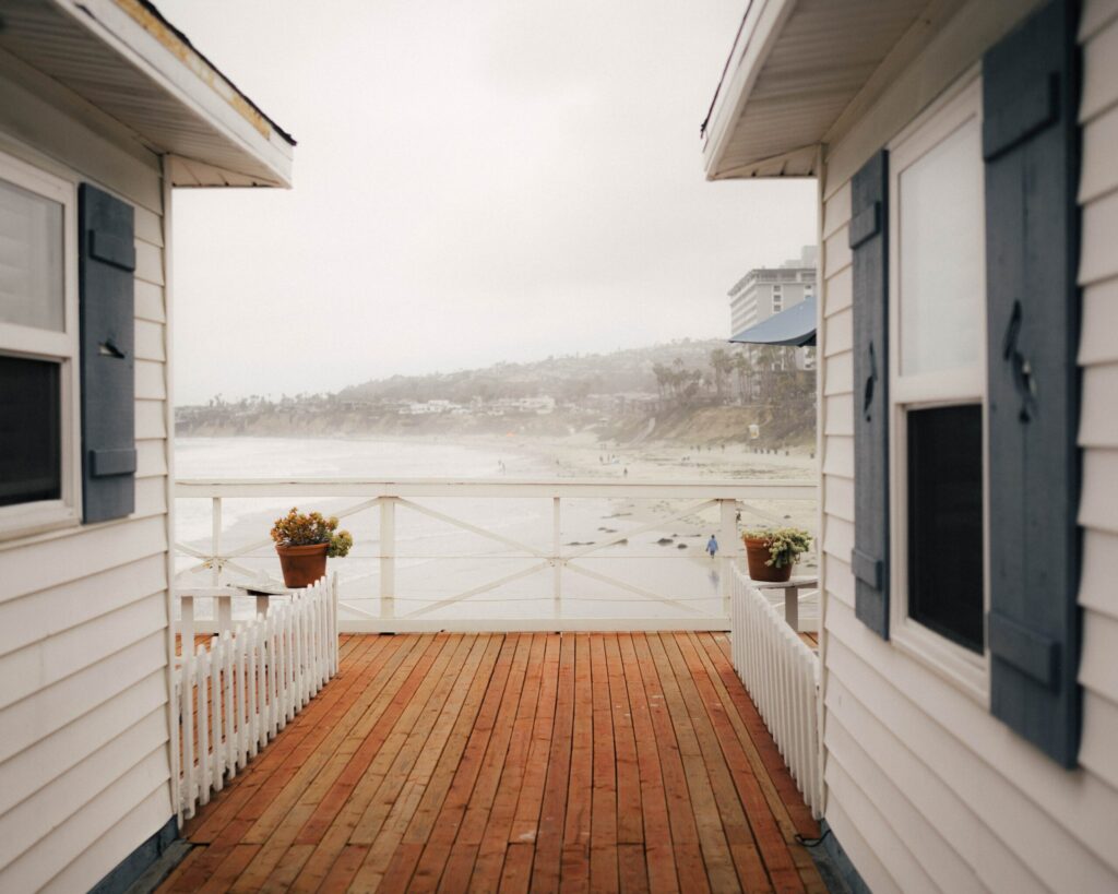 two houses side by side with hardwood weatherboard cladding