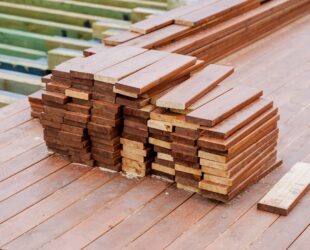 Pile of leftover offcuts of timber decking boards, ready to be used in other projects