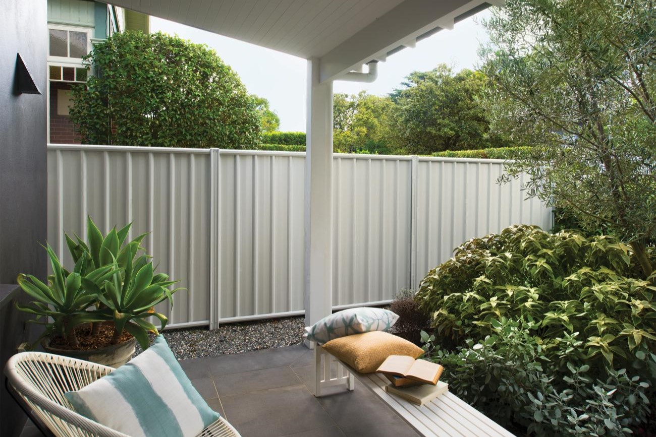 Surfmist Colorbond fence in backyard